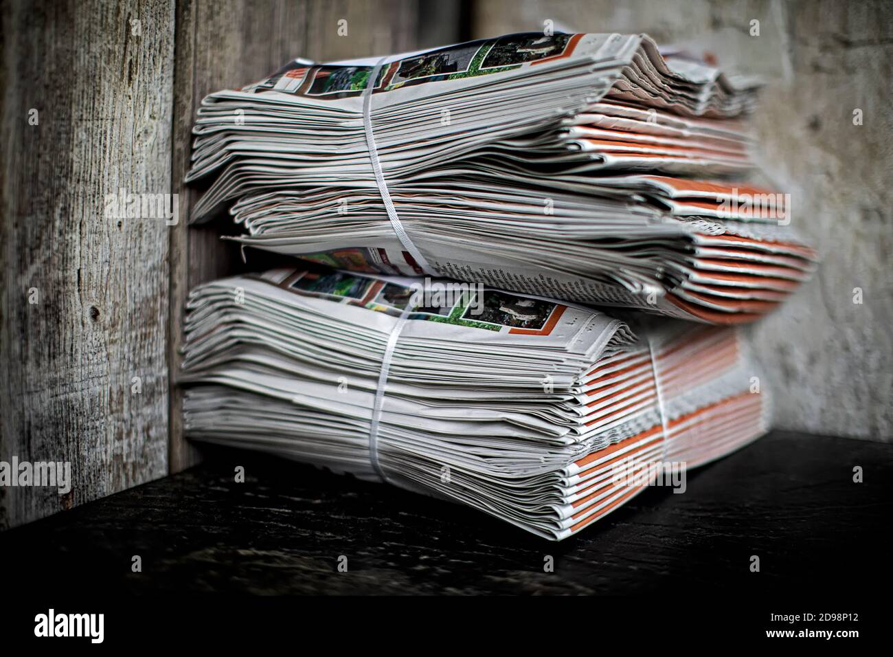 two bundles of newspapers   waiting to be picked up Stock Photo