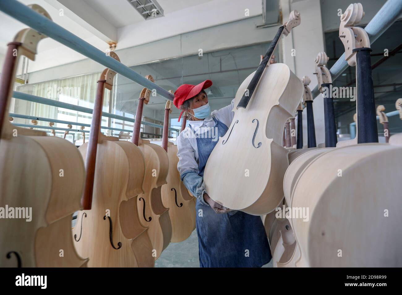 Taizhou China S Jiangsu Province 3rd Nov A Worker Checks A Cello At A Workshop In Huangqiao Town Of Taixing East China S Jiangsu Province Nov 3 As A Famed Bowed String