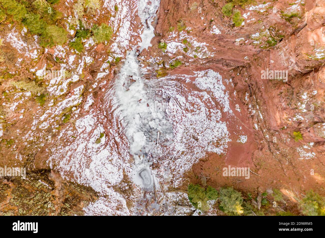 Drone image of the partially frozen water fall at Dunton Hot Springs, Colorado Stock Photo