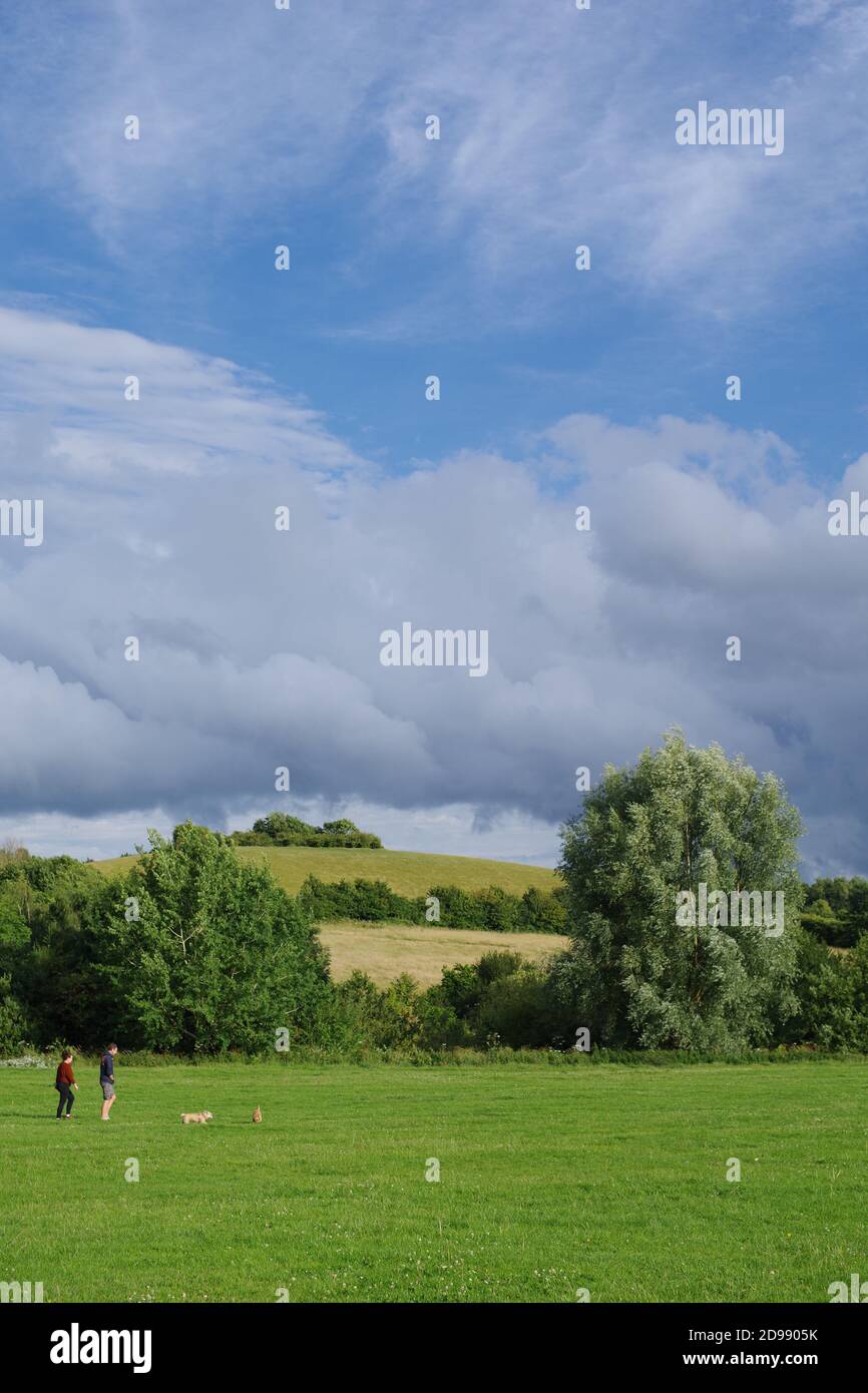 Rolly-Polly Hill under a Moody Brooding Sky, Ludwell Valley Park, Exeter, Devon, UK. Stock Photo