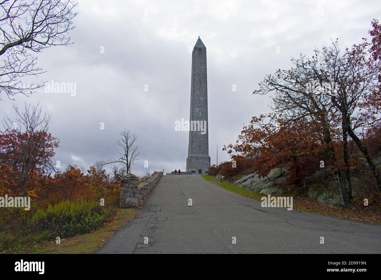 Cloudy skies, lush Autumn foliage, and the High Point Monument at High Point State Park in New Jersey, USA -04 Stock Photo