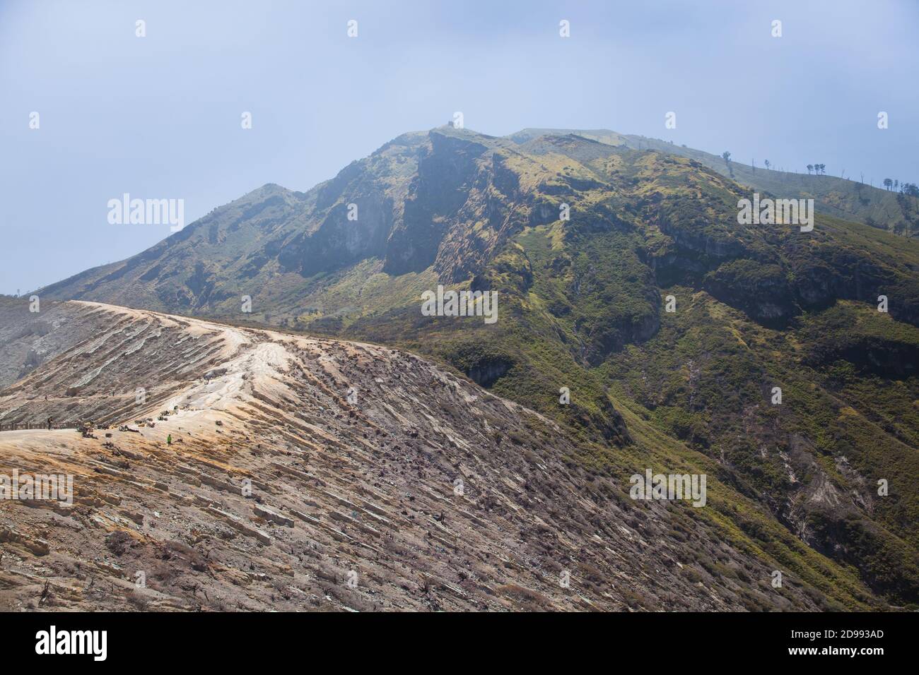 Ijen Volcano, Indonesia. Workers mine sulfur from the crater of the ...