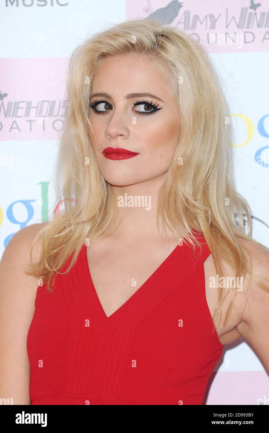 English singersongwriter Pixie Lott attends the Amy Winehouse