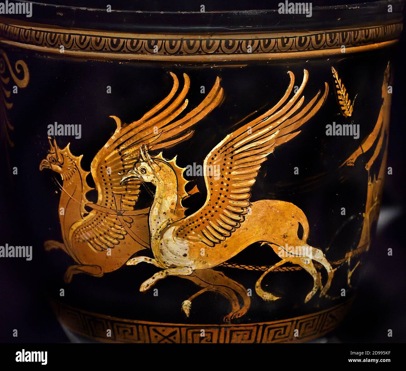 Winged Griffins led by Nike Situla   Greek, Greece, ( Griffins, animals that are half eagle and half lion, represented wisdom, strength, and cunning in Greek mythology ) Stock Photo