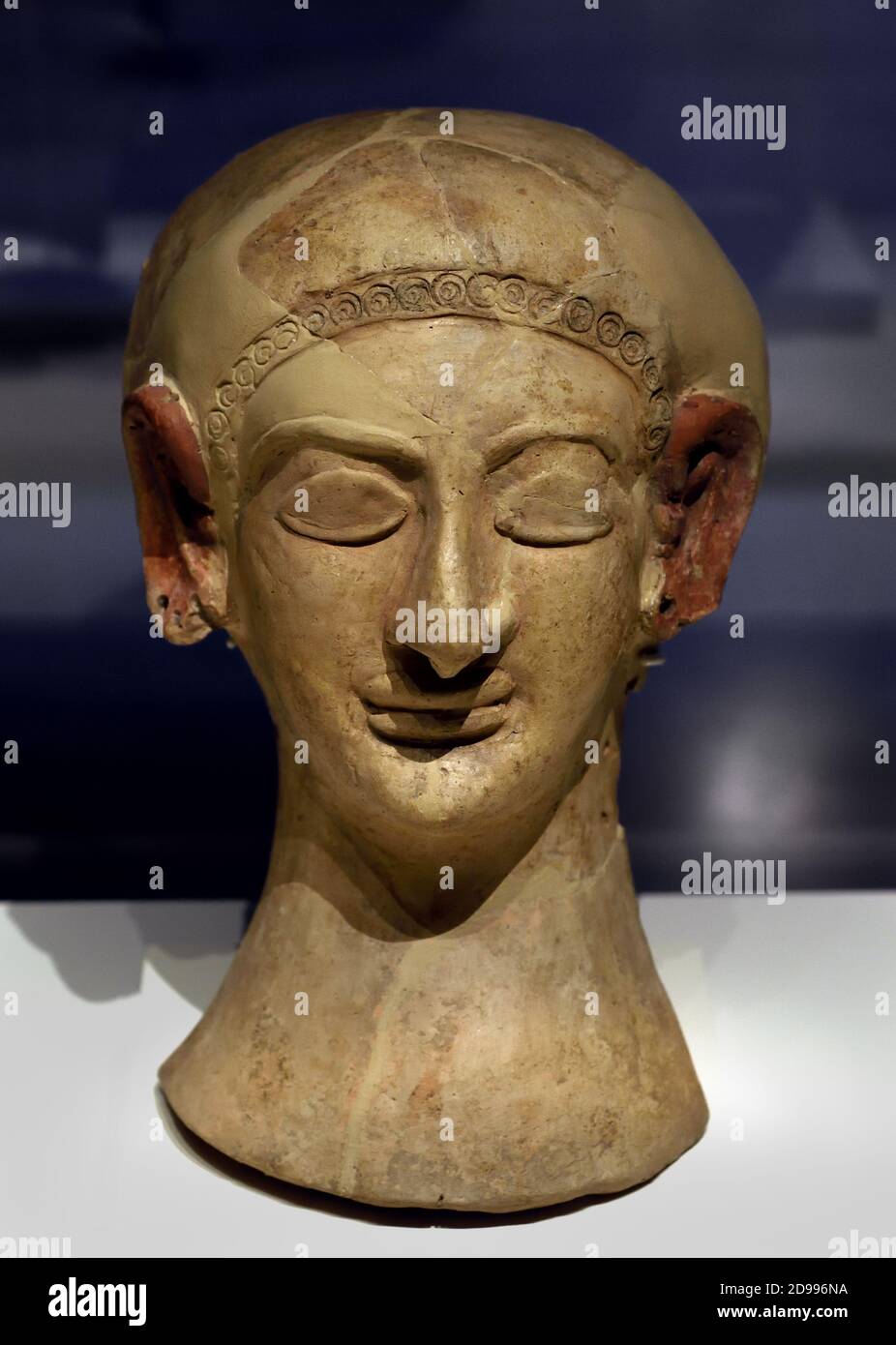 Mask 4th-3rd century BC ( Mass produced in Moulds by Sicilian and Carthaginian models,  ( Image of deity from the Phoenician Punic Pantheon ) Greek ( National Archaeological Museum Spain ) Stock Photo