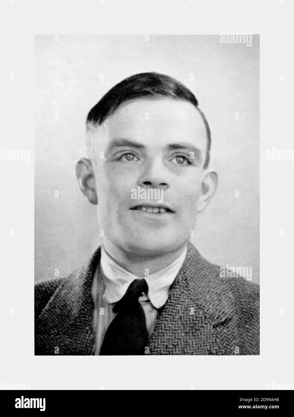 1937 , GREAT BRITAIN: The british scientist ALAN TURING ( 1912 - 1954 ) aged 35,. Turing was a British mathematician , logician, cryptanalyst , philosopher, computer scientist , mathematical biologist, and marathon and ultra distance runner. He was highly influential in the development of computer science, providing a formalisation of the concepts of algorithm and computation with the Turing machine, which can be considered a model of a general purpose computer . Turing is widely considered to be the father of theoretical computer science and artificial intelligence . - CERVELLO ELETTRONICO - Stock Photo