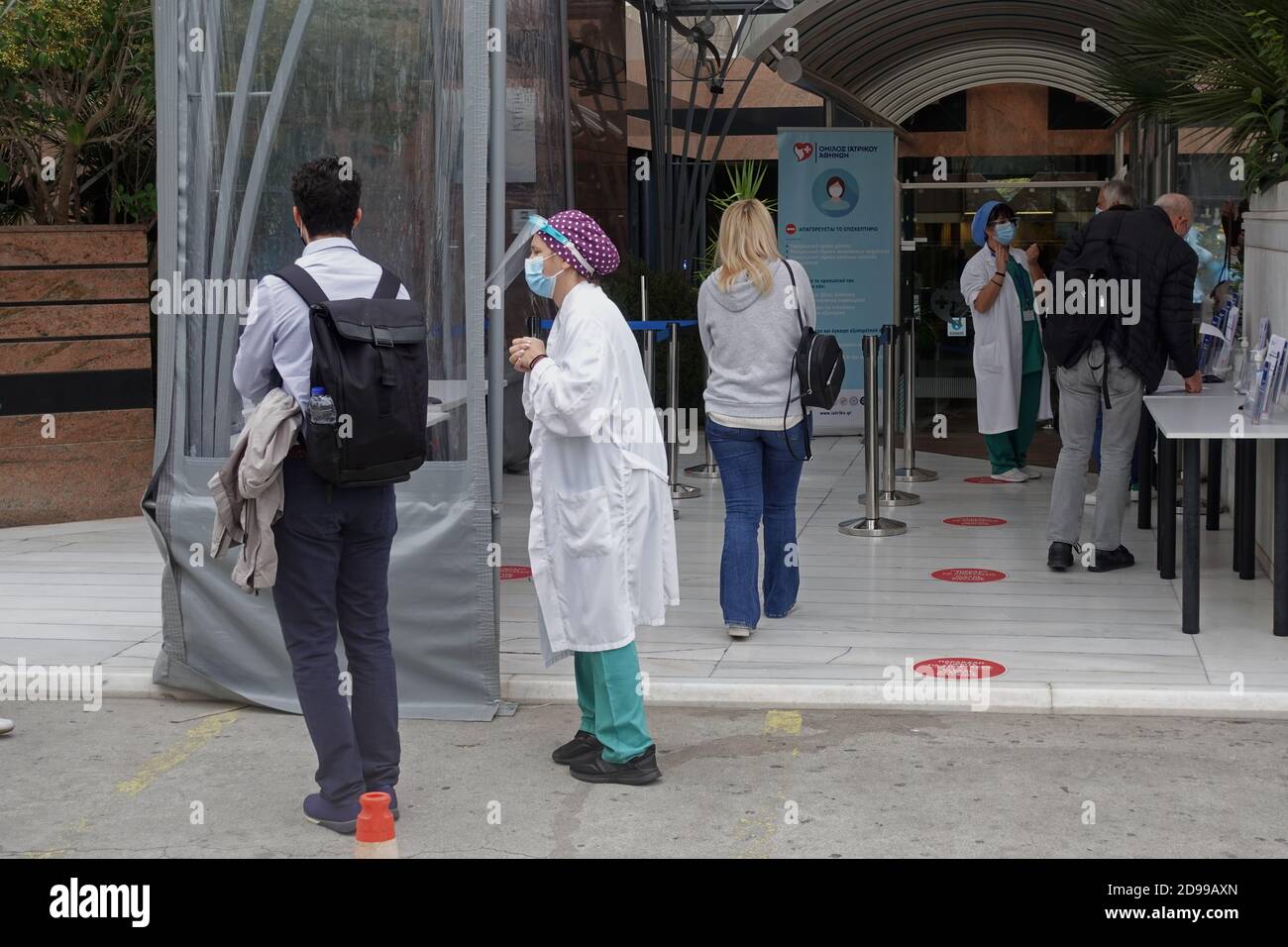Athens, Greece November 3, 2020 Doctors with face masks assist