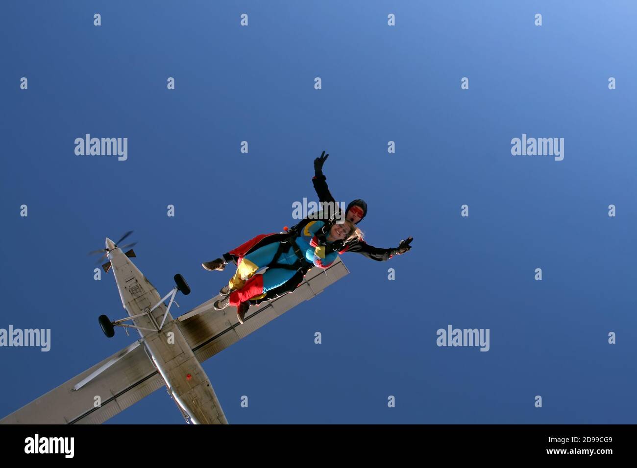 Skydive tandem jumping ou the plane Stock Photo