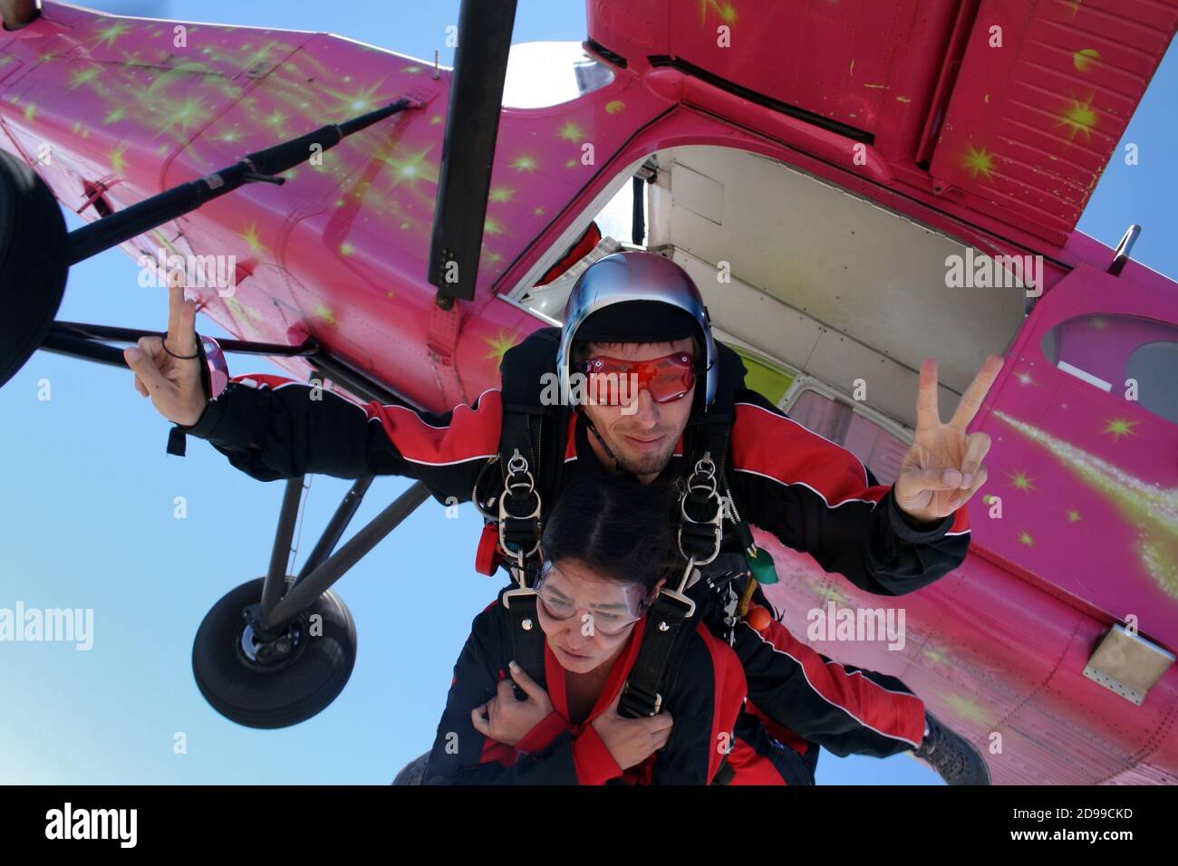 Sky diving tandem red color Stock Photo