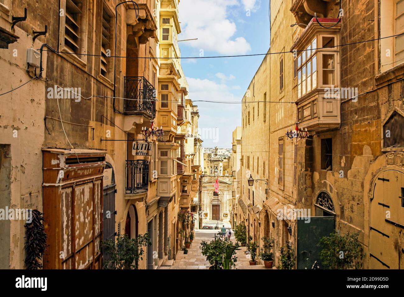 street view of old limestone buildings in valletta Malta Stock Photo
