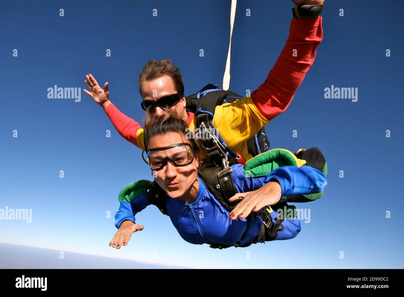 Skydiving tandem happy people Stock Photo