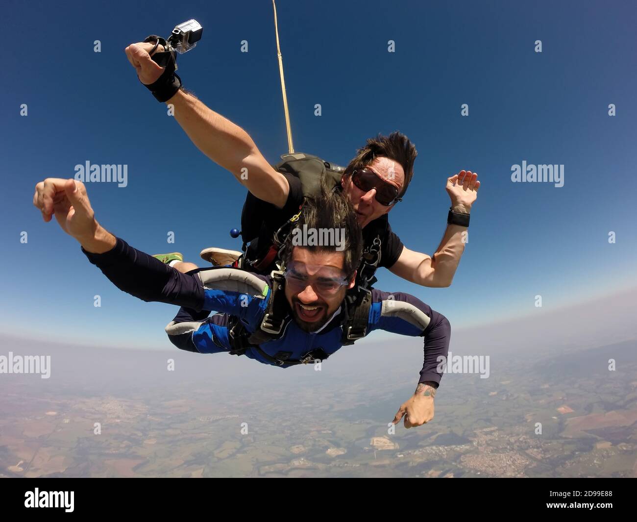Skydiving tandem friends Stock Photo