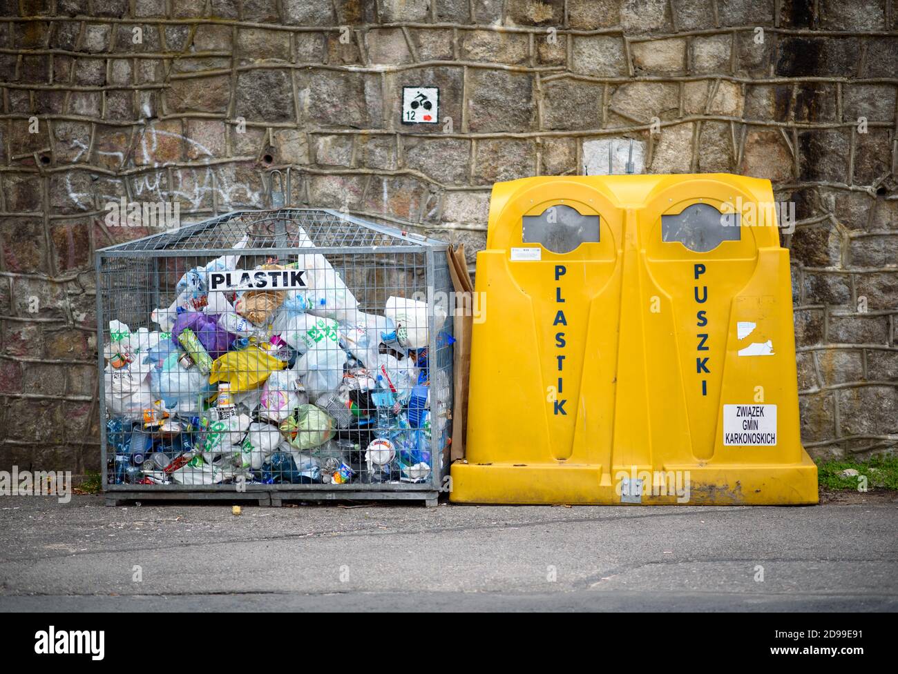 Szklarska Poreba, Poland / 08.09.2019: Colorful garbage containers for recycling of plastics and cans on one of the streets in Szklarska Poreba,Poland Stock Photo