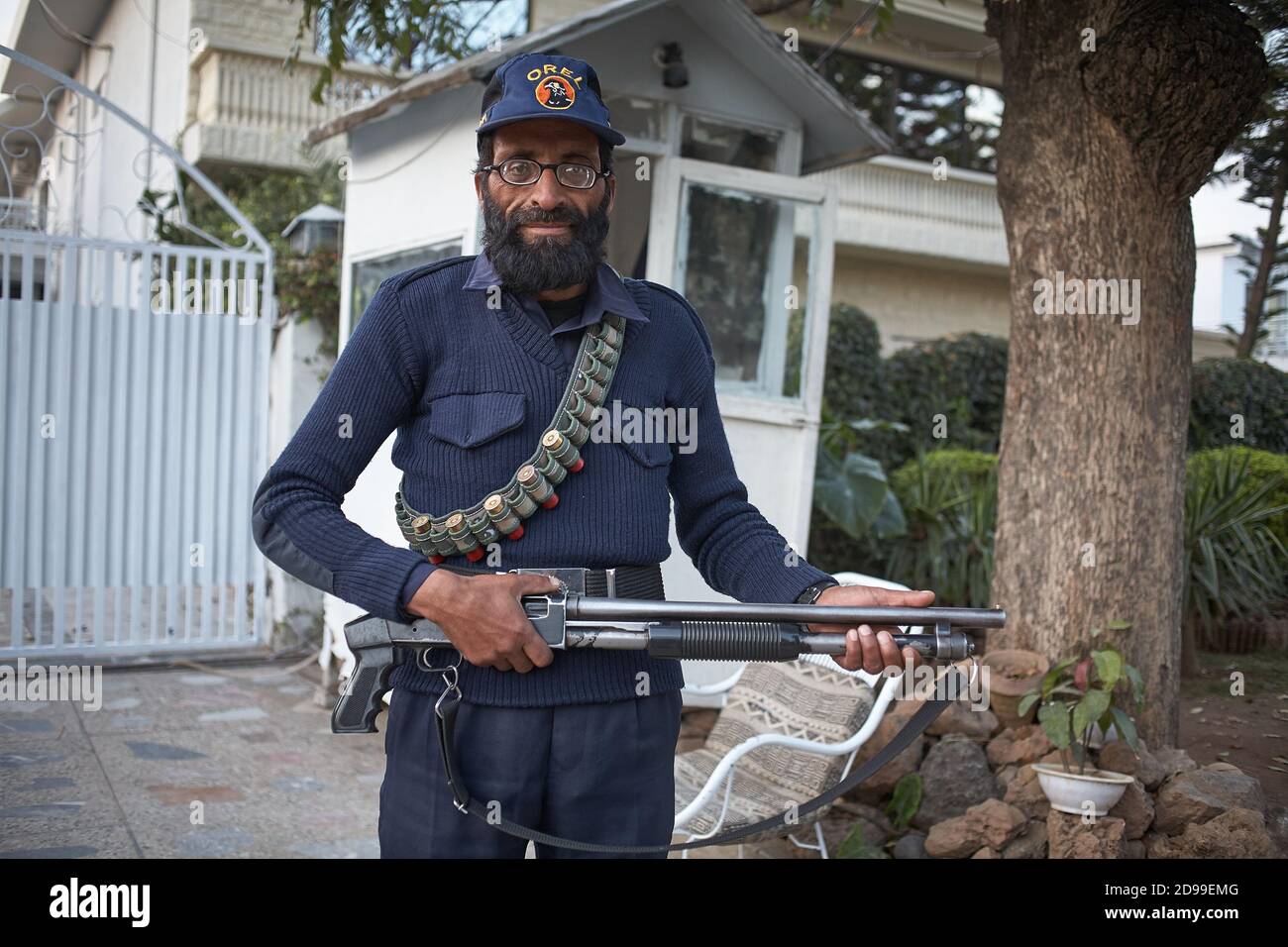 Islamabad, Pakistan, December 2008. Private security guard armed with a