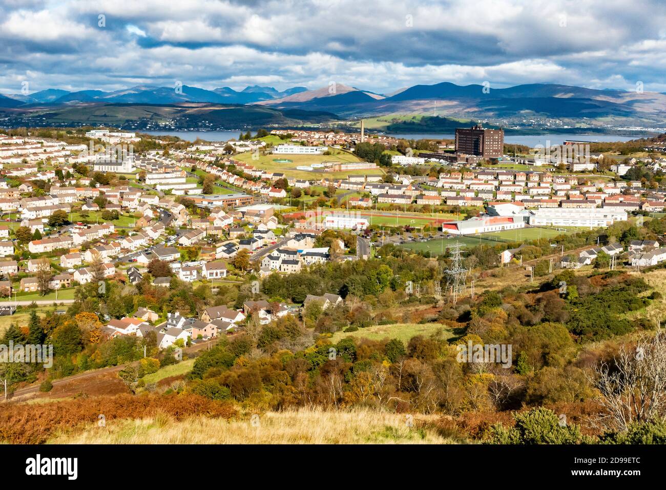 Elevated view of part of Greenock, Scotland, and looking over the Firth of Clyde towards the hills of Argyll. Stock Photo