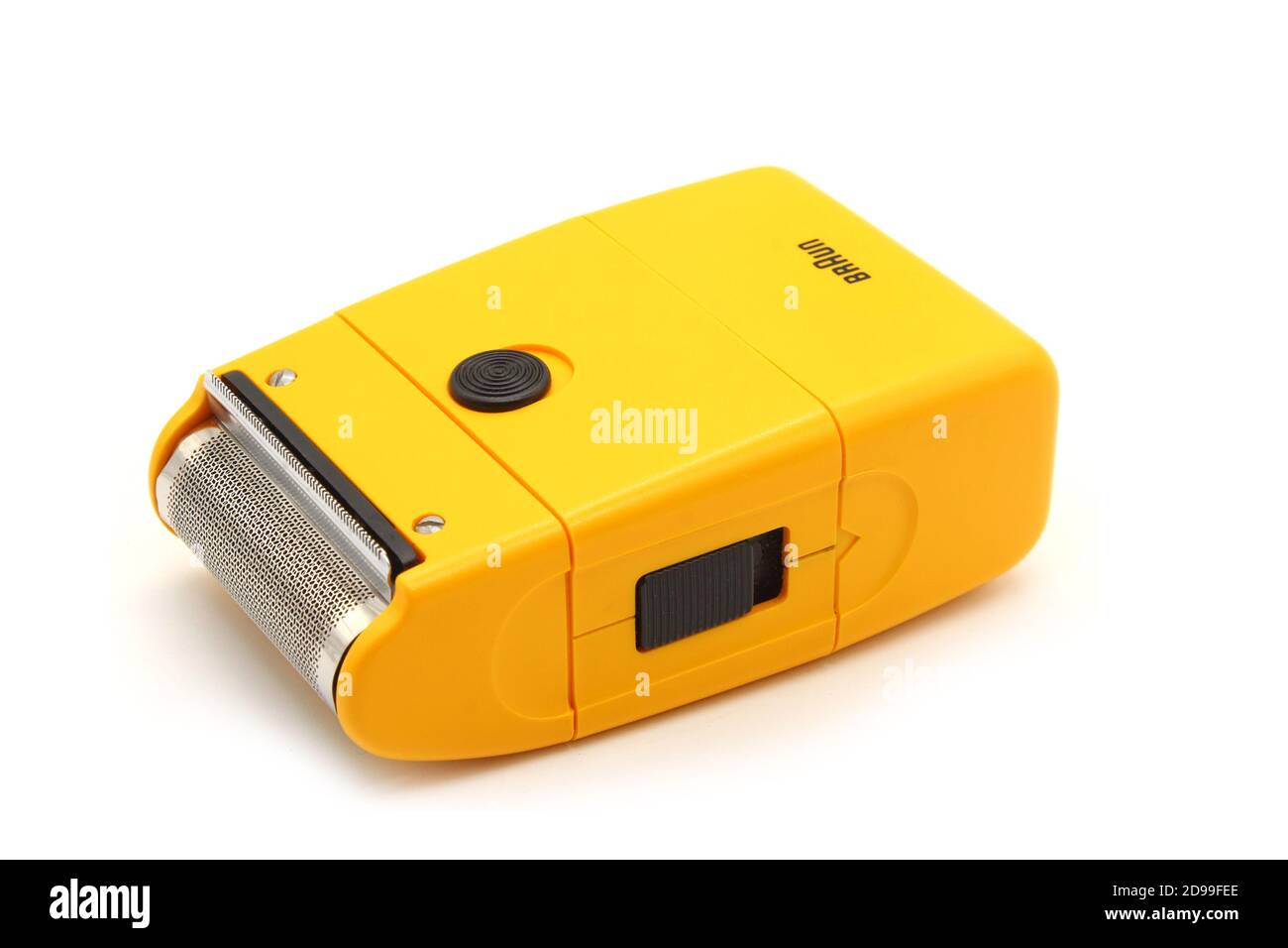 Vintage Braun yellow electric shaver, isolated on white background Stock  Photo - Alamy