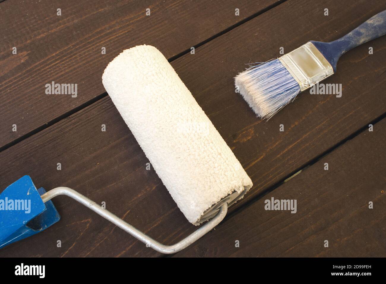 painting roller and paint brushes. Renovation concept Stock Photo Alamy