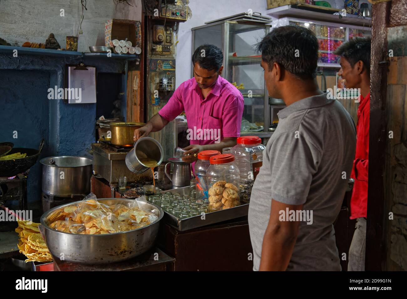 UDAIPUR, INDIA, November 5, 2017 : Masala tea is prepared in a small store of the traditional market in Udaipur, Rajasthan. Stock Photo