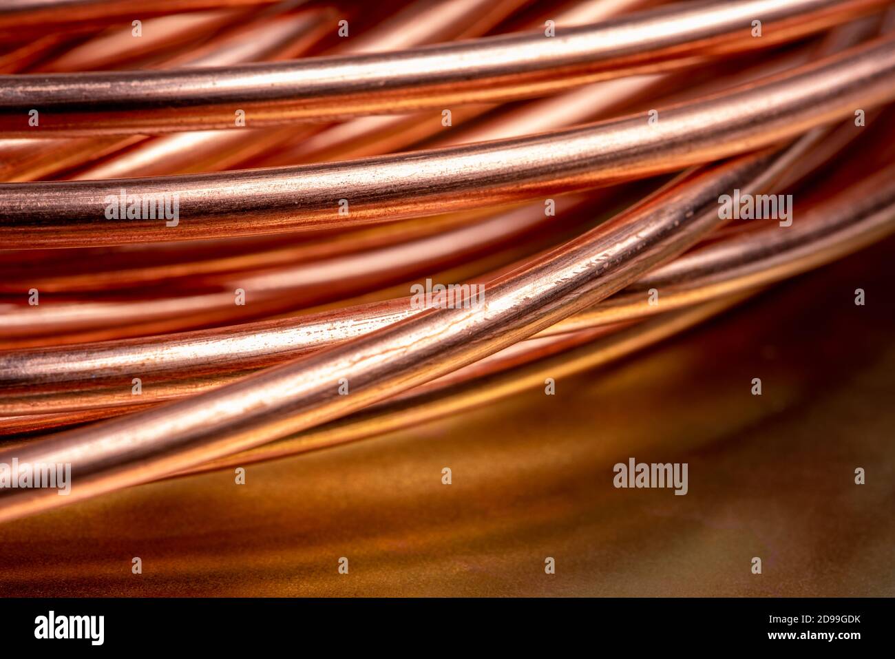 Electrical power cable close up. IEC standard color code. Cross-section  with cable jacket, wire insulations in brown, blue and yellow-green color  with flexible stranded copper wires. Macro photo. Stock Photo
