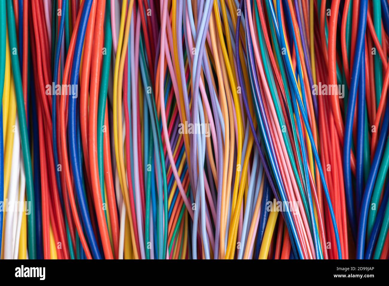 Mixture of multicolored cable directly above Stock Photo