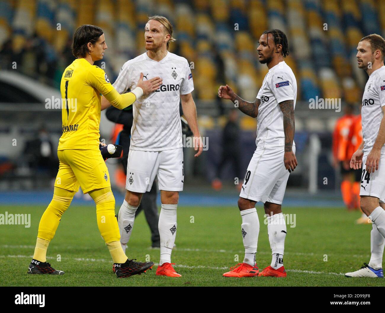 Players of Borussia Monchengladbach congratulate each other after the the UEFA Champions League group B football match between Shakhtar Donetsk and Borussia Monchengladbach at the Olimpiyskiy stadium.(Final score: Shakhtar Donetsk  0-6 borussia mönchengladbach) Stock Photo