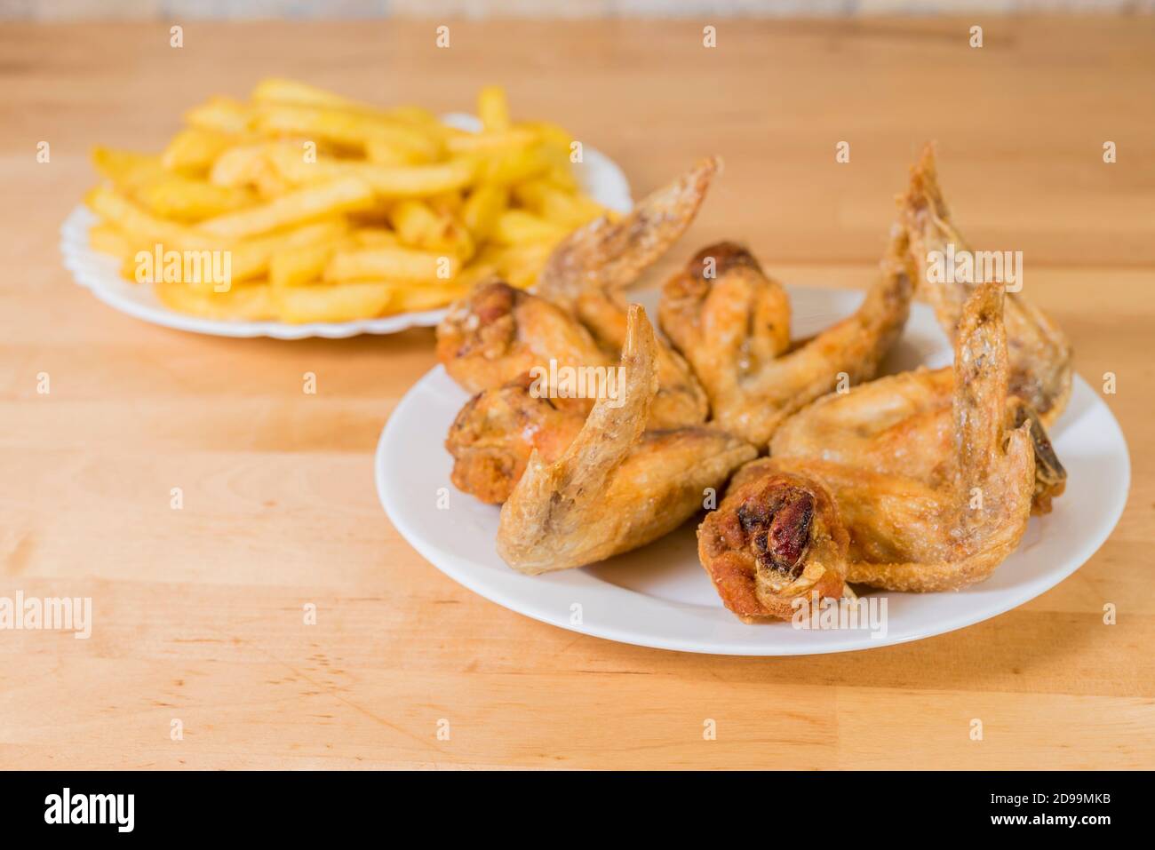 fried chicken wings with french fries Stock Photo