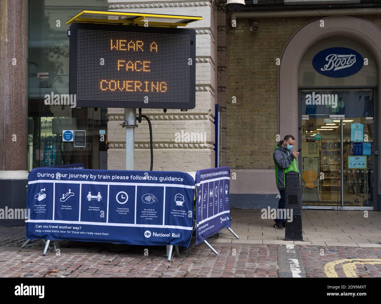 Led Infomation Sign Wear a face covering LED information sign at the side of the street ...