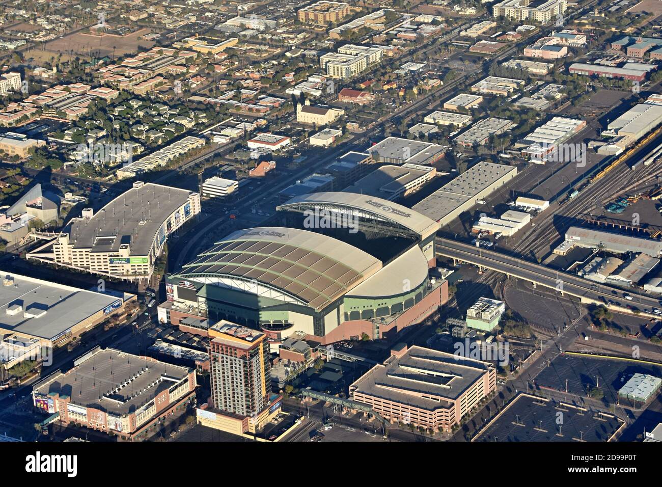 Aerial view from the airplane of retractable roof Chase Field baseball stadium and city skyline of downtown Phoenix, Arizona Stock Photo