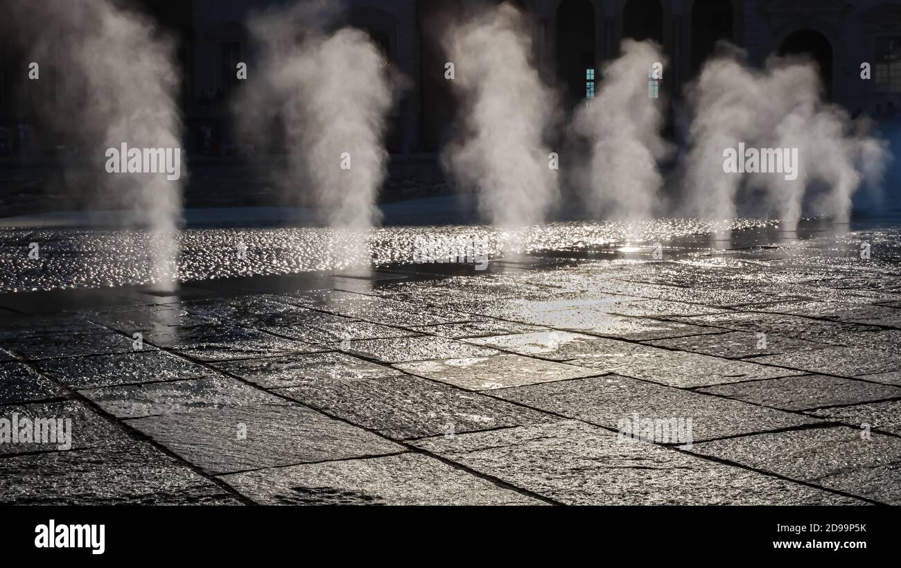 Urban steam fountains close-up from the ground Stock Photo