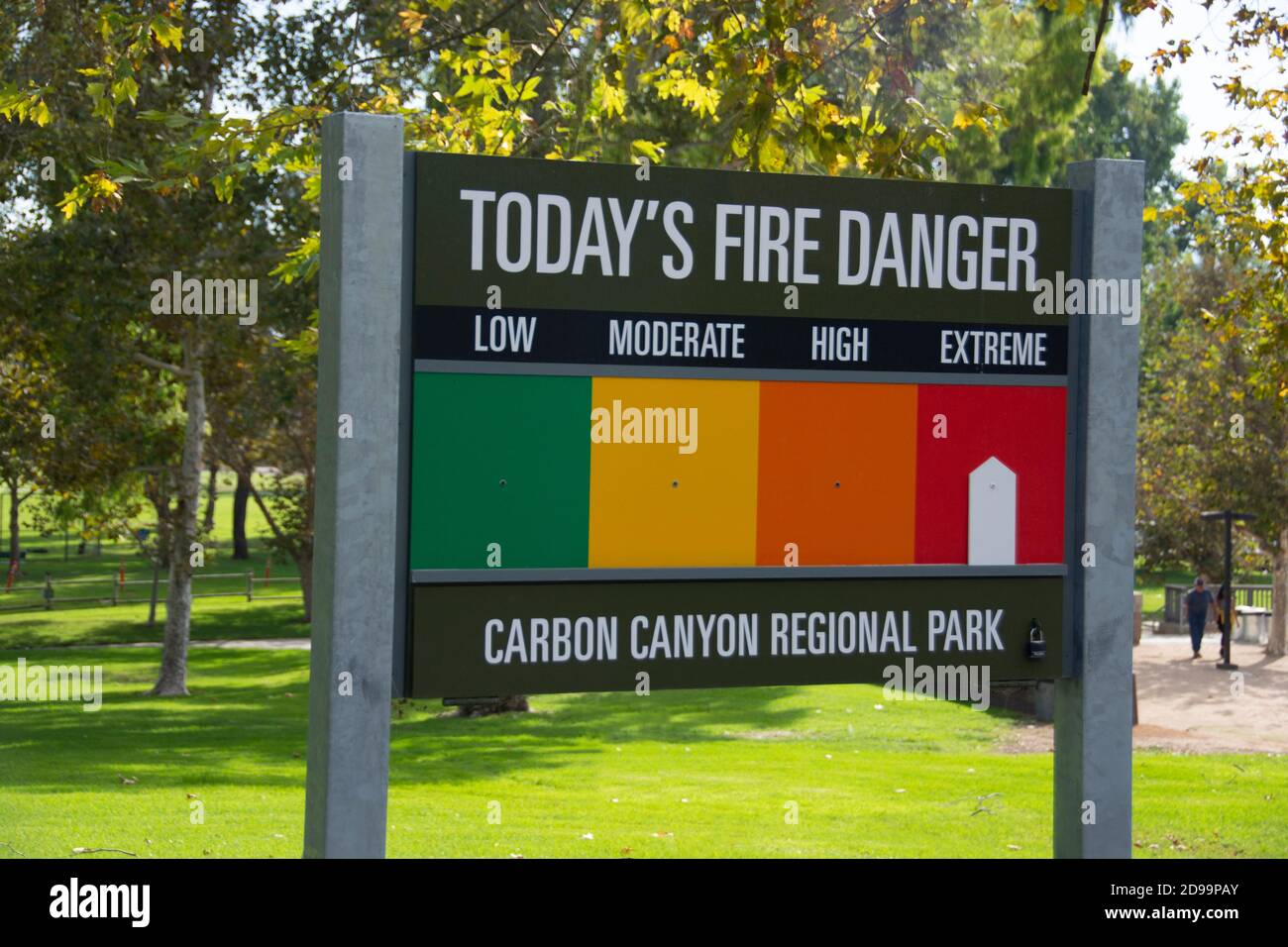 A sign showing that day's fire danger, which for November 1, 2020 was considered extreme. Carbon Canyon Regional Park, Brea, California, USA. Stock Photo