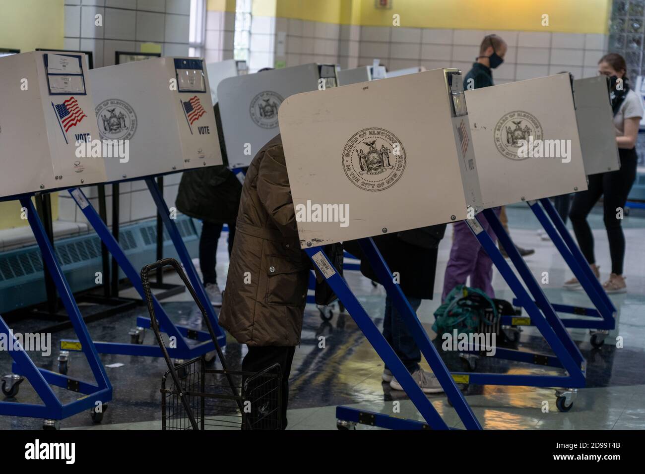People cast their votes for the 2020 U.S Presidential Election at a ...
