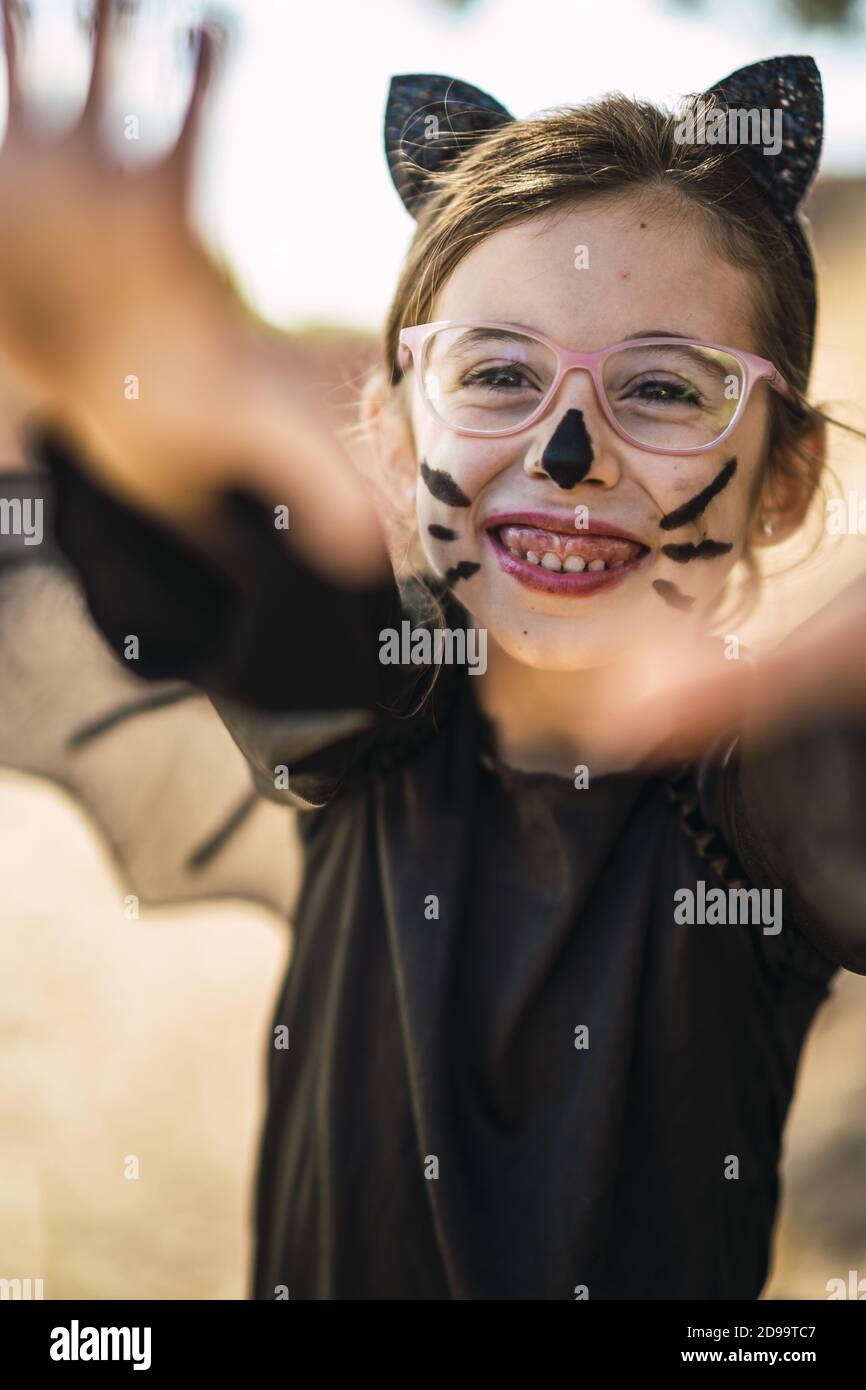 Portrait of a cute little girl wearing a Halloween cat costume Stock ...