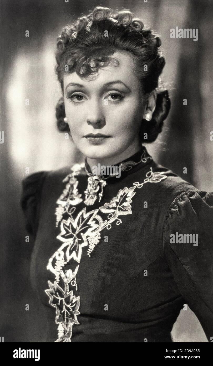 1938 , GERMANY :  The  Nazi Diva german singer and movie actress  ZARAH LEANDER  ( born Zarah Stina Hedberg , 1907 - 1981 ) in the movie HEIMAT ( ' Casa paterna ' ) by Carl Froelich  - MOVIE - CINEMA - CANTANTE - NAZIST - NAZISMO - NAZISM -  WWII - SECONDA GUERRA MONDIALE - portrait - ritratto - ricamo - embroidery - orecchini - earrings -  perla - perle - pearl - pearls - gioiello - gioielli - jewel - jewellery - jewels ----  Archivio GBB Stock Photo