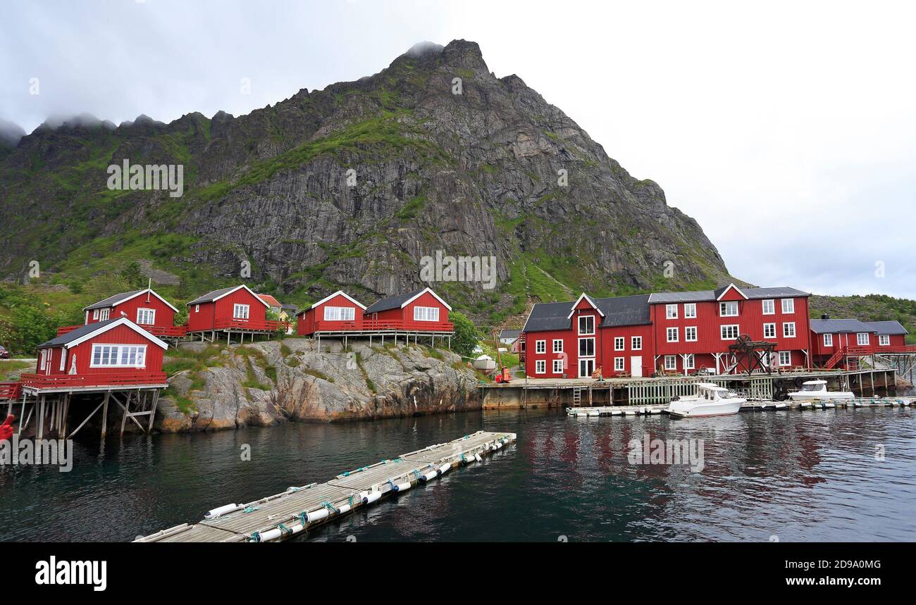 Traditional red rorbu houses, fishing boats in Å village, Lofoten Islands, Norway Stock Photo