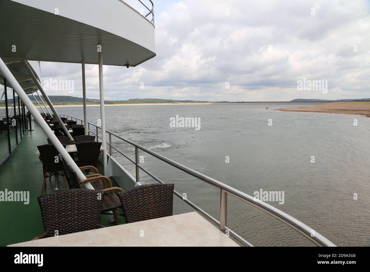 Tables and chairs on a boat deck at a tour on a Lake in Bavaria Stock ...