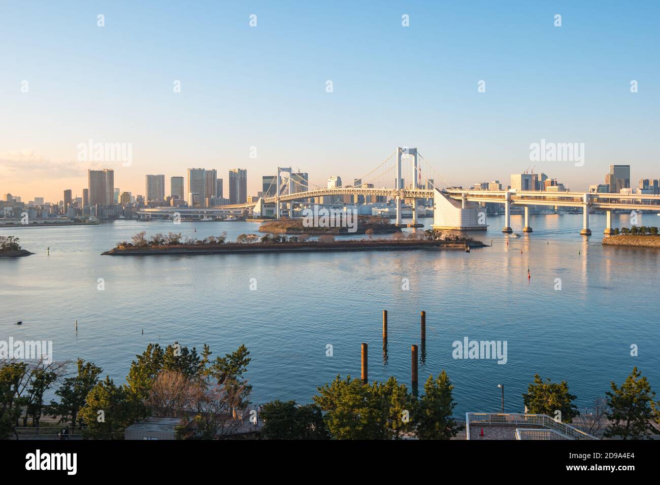 Rainbow Bridge with view of Tokyo Bay and city skyline in Tokyo city, Japan. Stock Photo