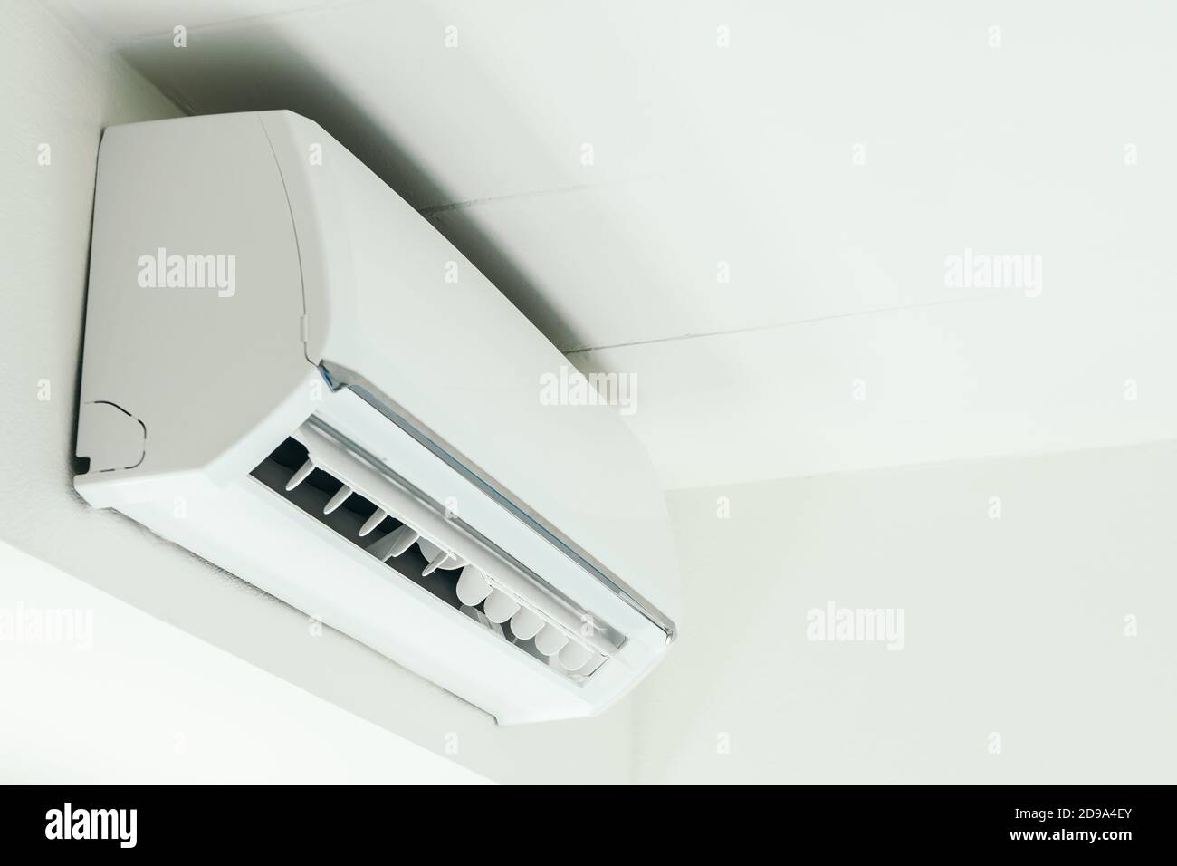 Air conditioner hanging on the wall Stock Photo Alamy