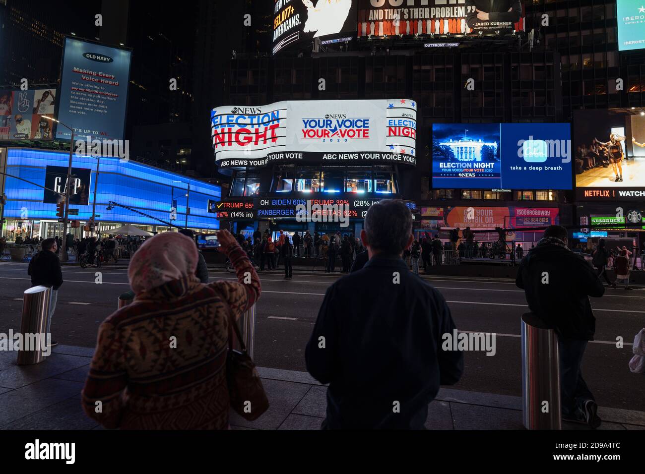 New York, New York, USA. 3rd Nov, 2020. People in Times Square watch early election returns come in. Credit: Joseph Reid/Alamy Live News Stock Photo