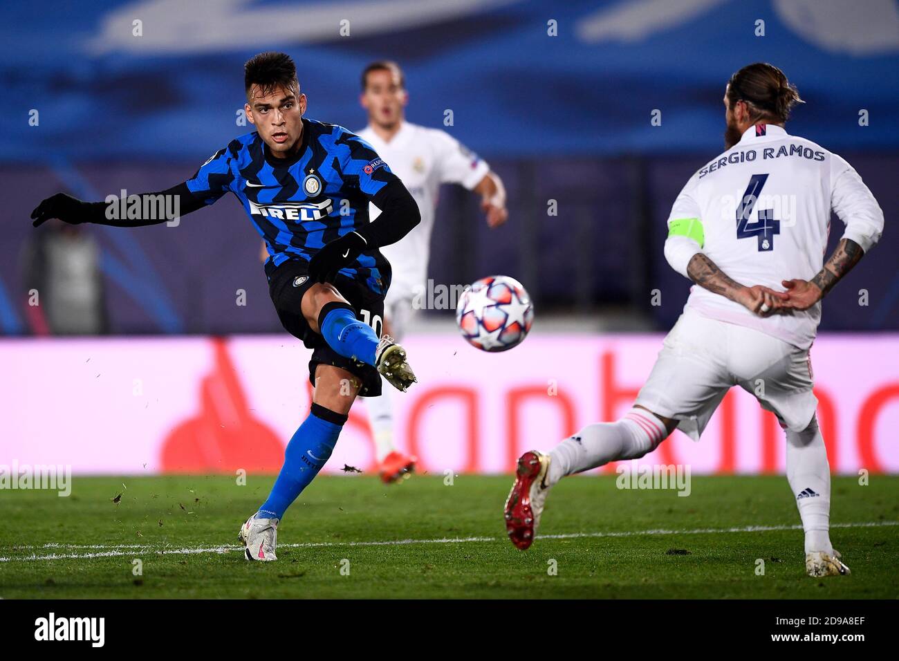 Madrid, Spain - 03 November, 2020: Lautaro Martinez (L) of FC Internazionale is challenged by Sergio Ramos of Real Madrid CF during the Champions League Group B football match between Real Madrid CF and FC Internazionale. Real Madrid CF won 3-2 over FC Internazionale. Credit: Nicolò Campo/Alamy Live News Stock Photo