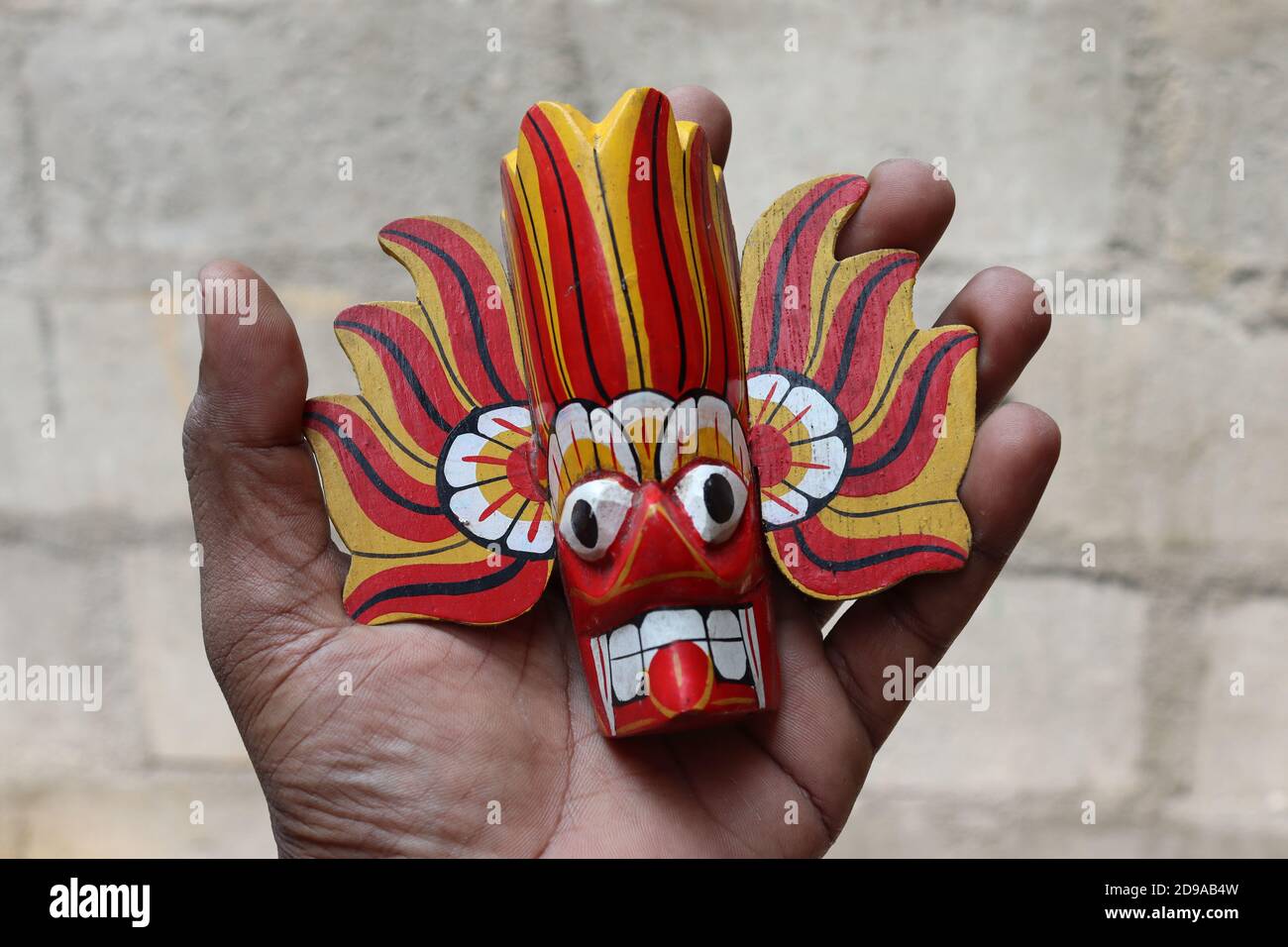 Very special and famous traditional dancing face mask but small size. All local people know who this is and local name is 'Gara Yaka' means the devil. Stock Photo
