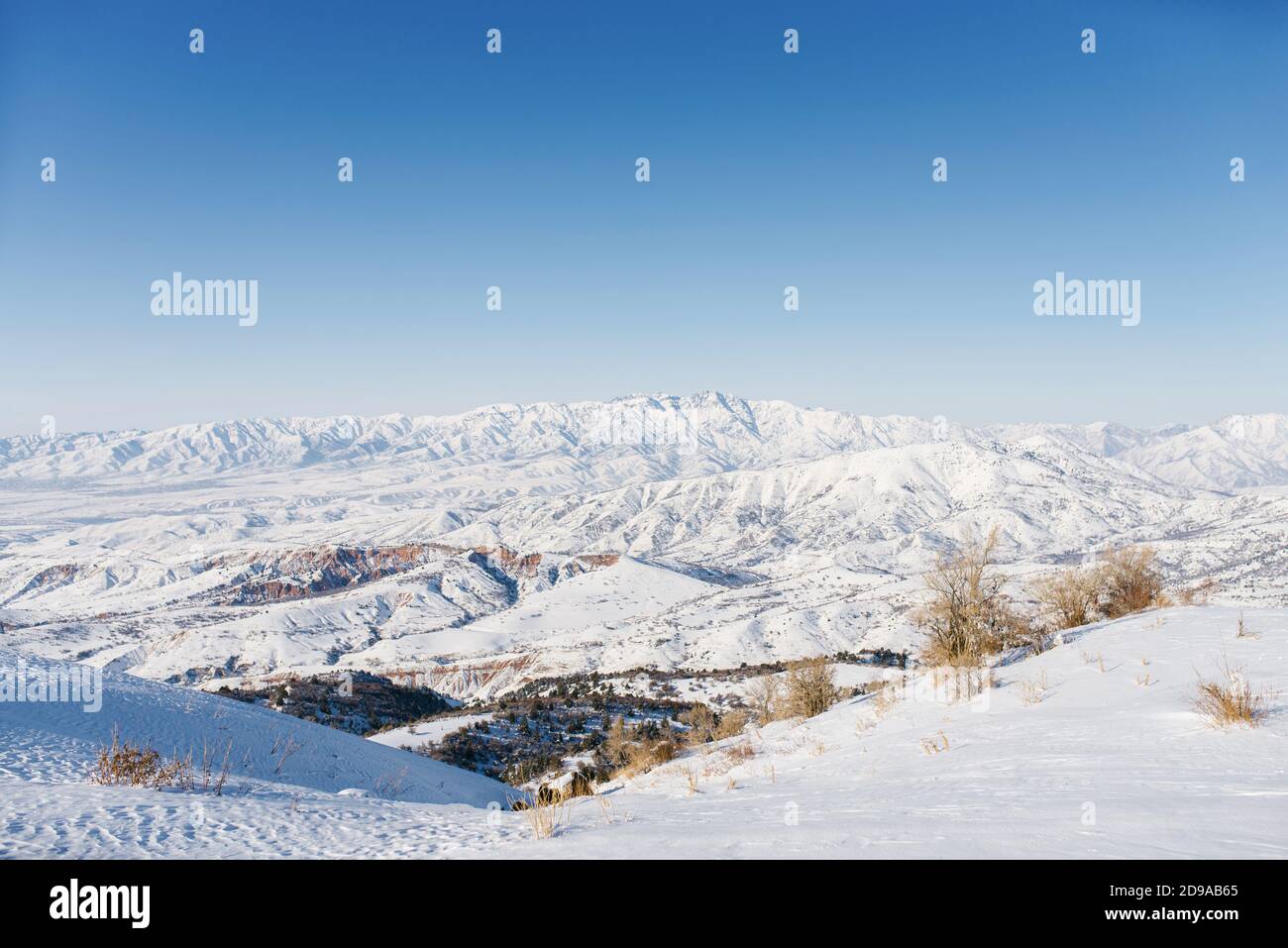 Panoramic view of the mountains with rocks in the Tien Shan mountains in Central Asia near Tashkent on a Sunny winter day. The best view from the Beld Stock Photo
