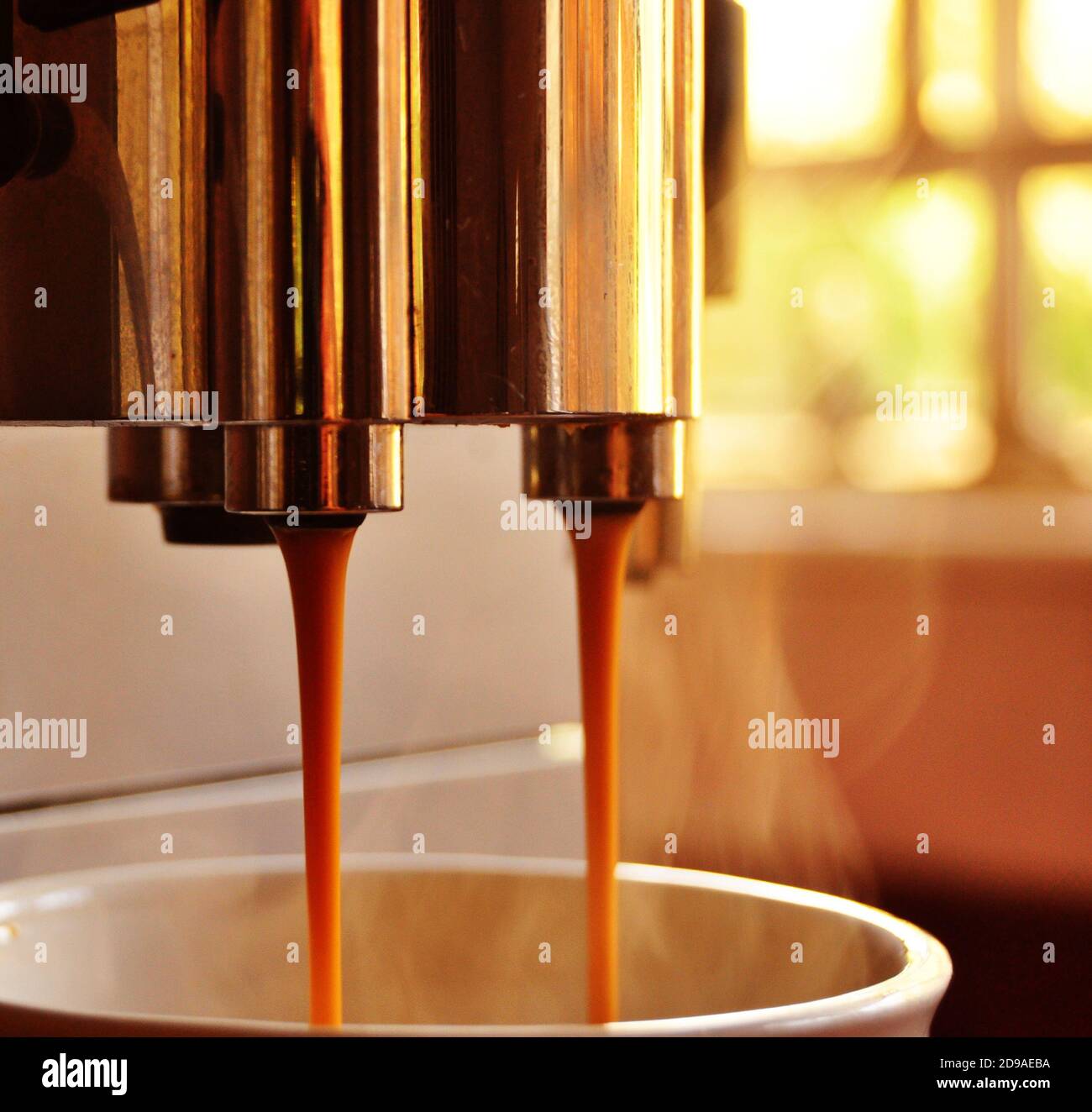 Coffee machine making strong espresso for good morning Stock Photo