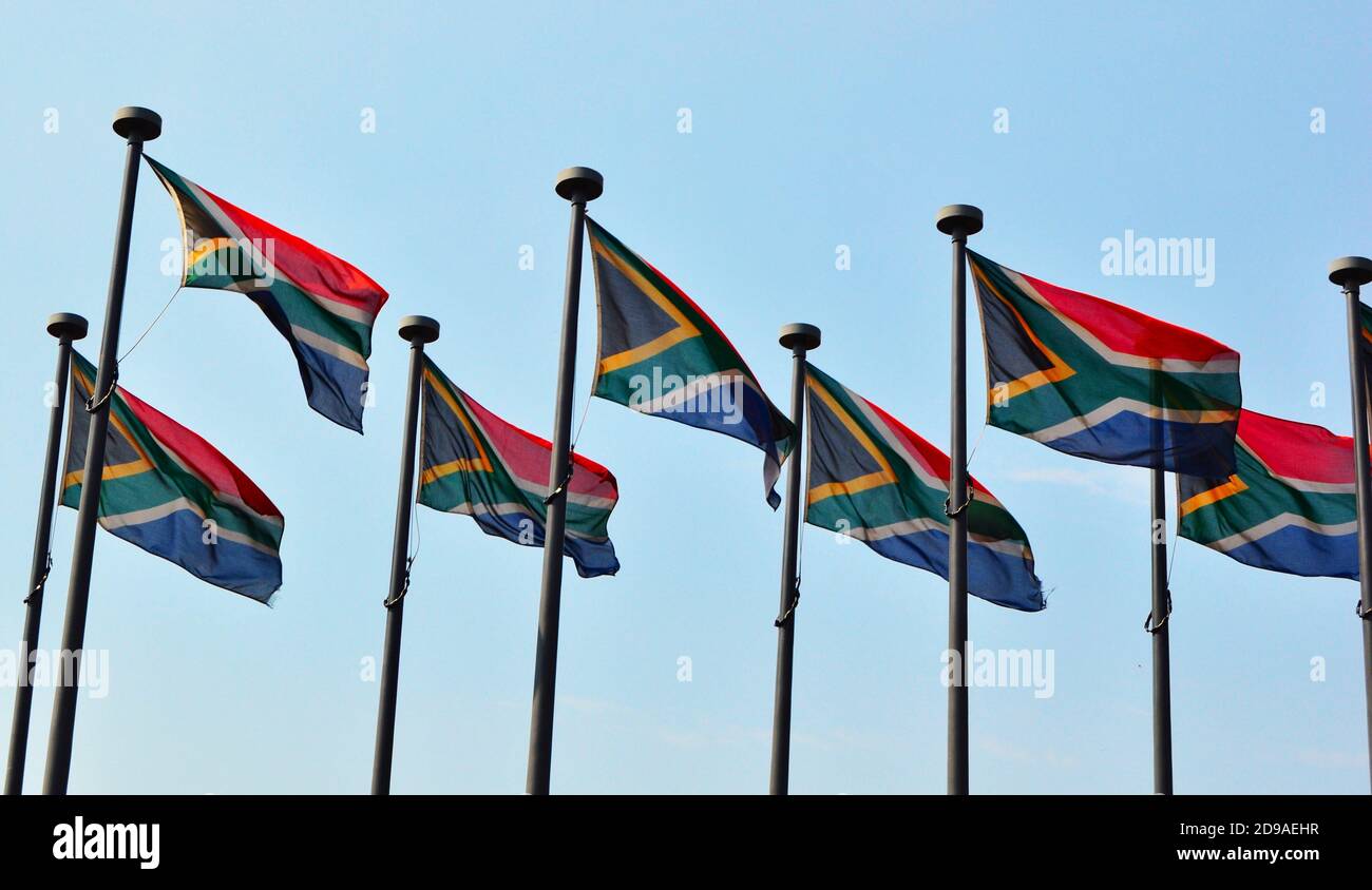 South African flags flutter on the flagpoles against the sky, Union buildings, Pretoria, South Africa Stock Photo