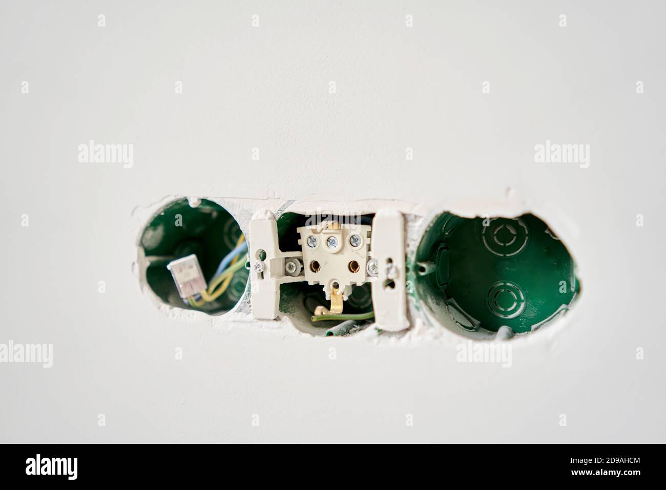 Three sockets. Installation high voltage. Electrical wires sticking out