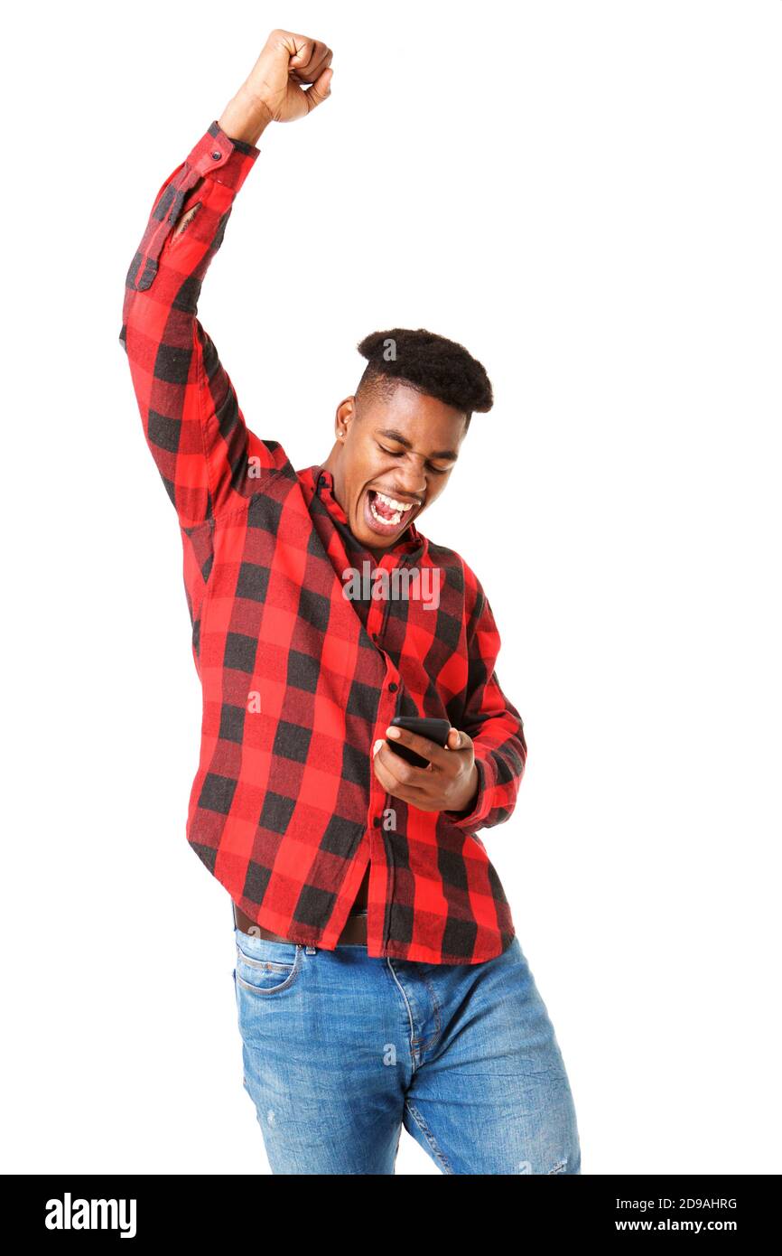 Modern young man cheering win hi-res stock photography and images - Alamy
