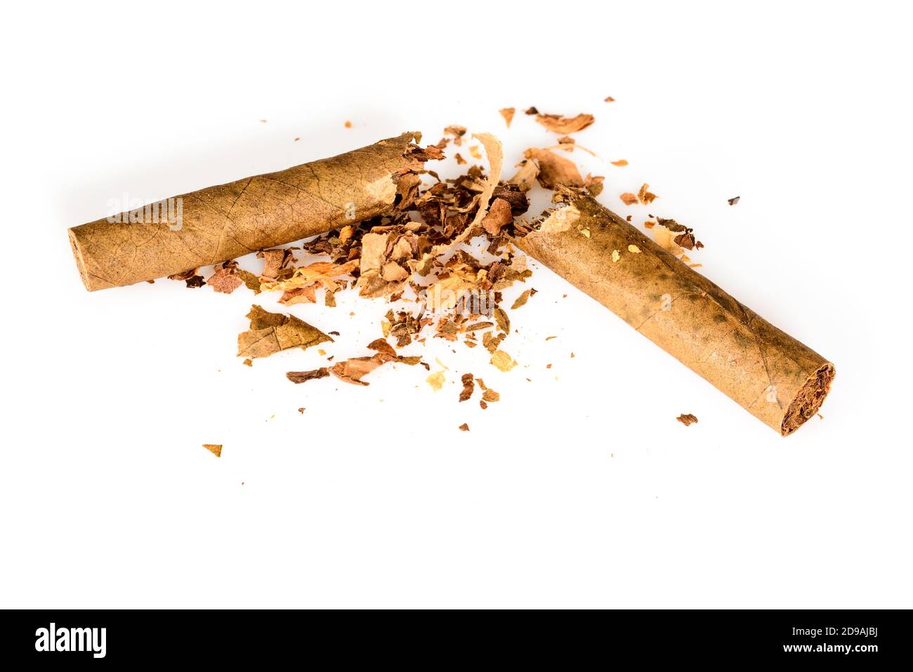 Broken tobacco cigarillo as a concept of quitting smoking. World No Tobacco Day. Isolated on white background, close up high resolution. Stock Photo