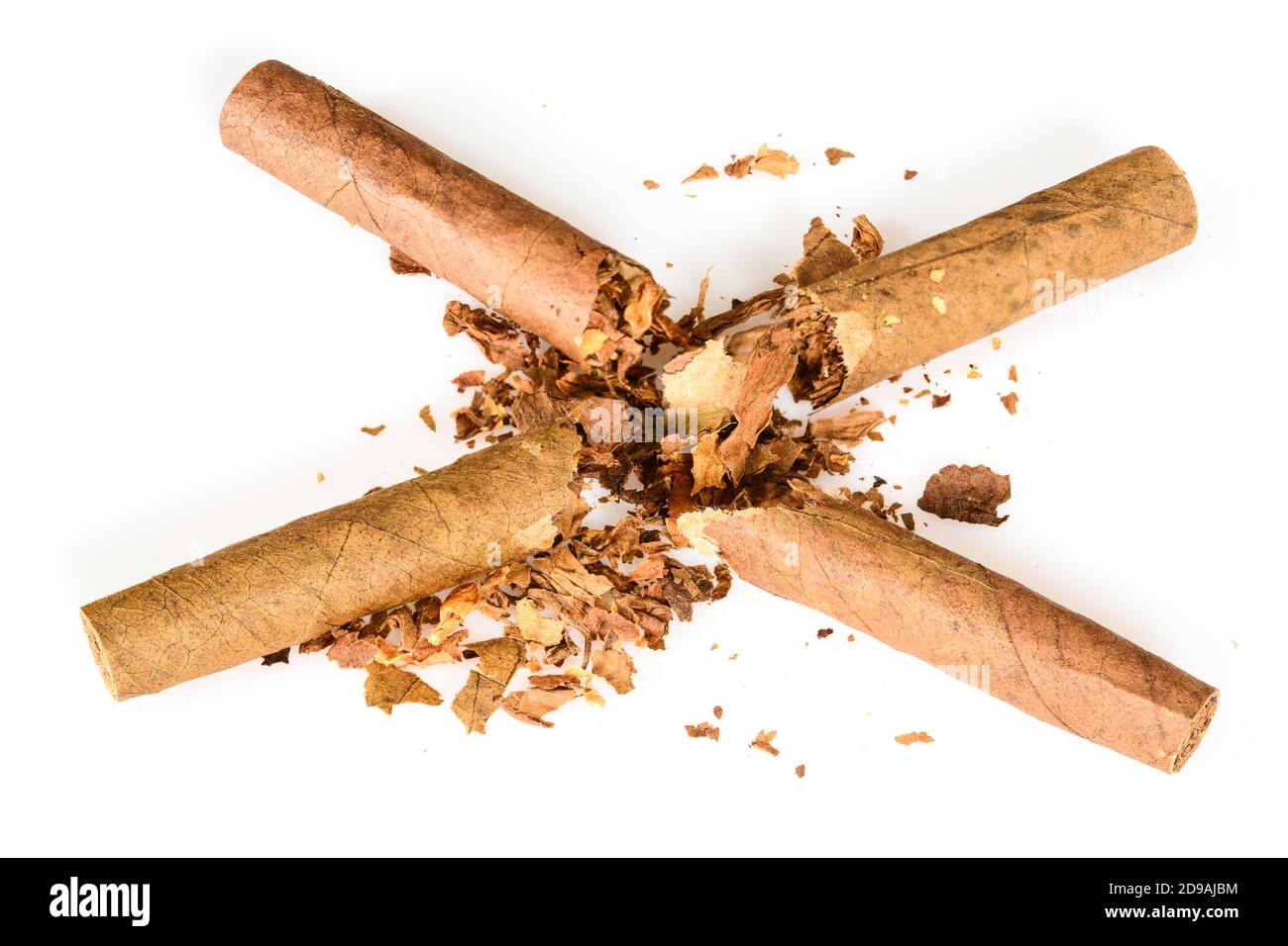 Broken two tobacco cigarillos as a concept of quitting smoking. World No Tobacco Day. Cigarettes isolated on white background, close up high resolutio Stock Photo