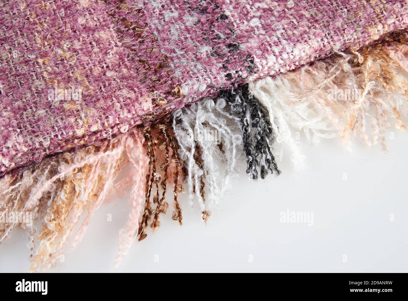 Detail of a Elegant Muliticolored fabric scarf on white background Stock Photo