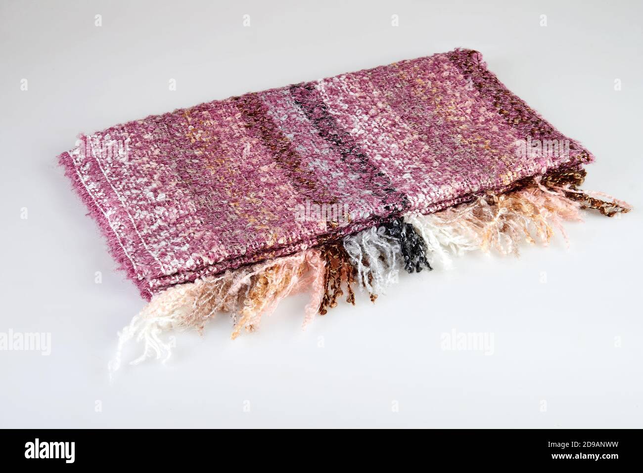 Muliticolored fabric of a elegant scarf on white background Stock Photo