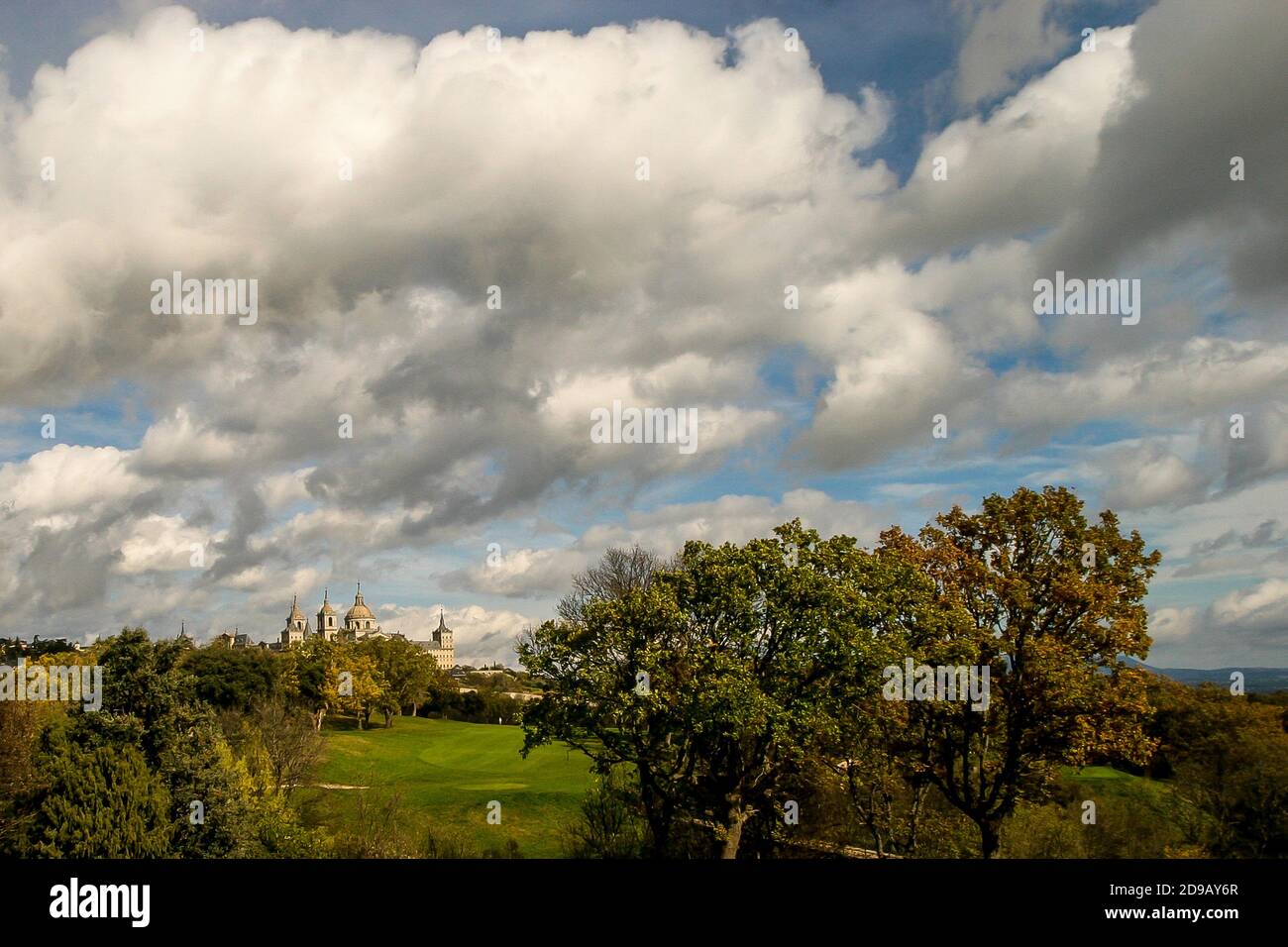 View of the Monastery of San Lorenzo del Escorial from the La Herreria golf course in Madrid, Spain Stock Photo